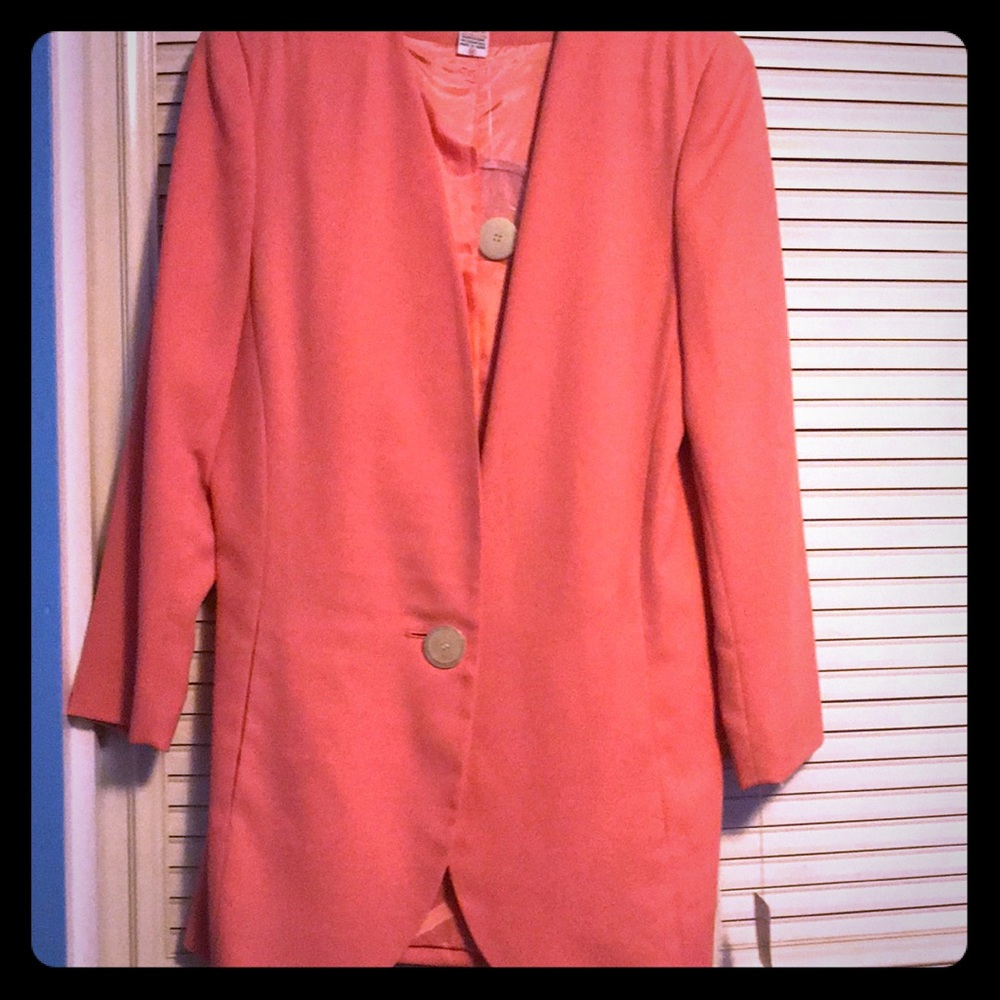 Two piece blazer with pleated skirt
